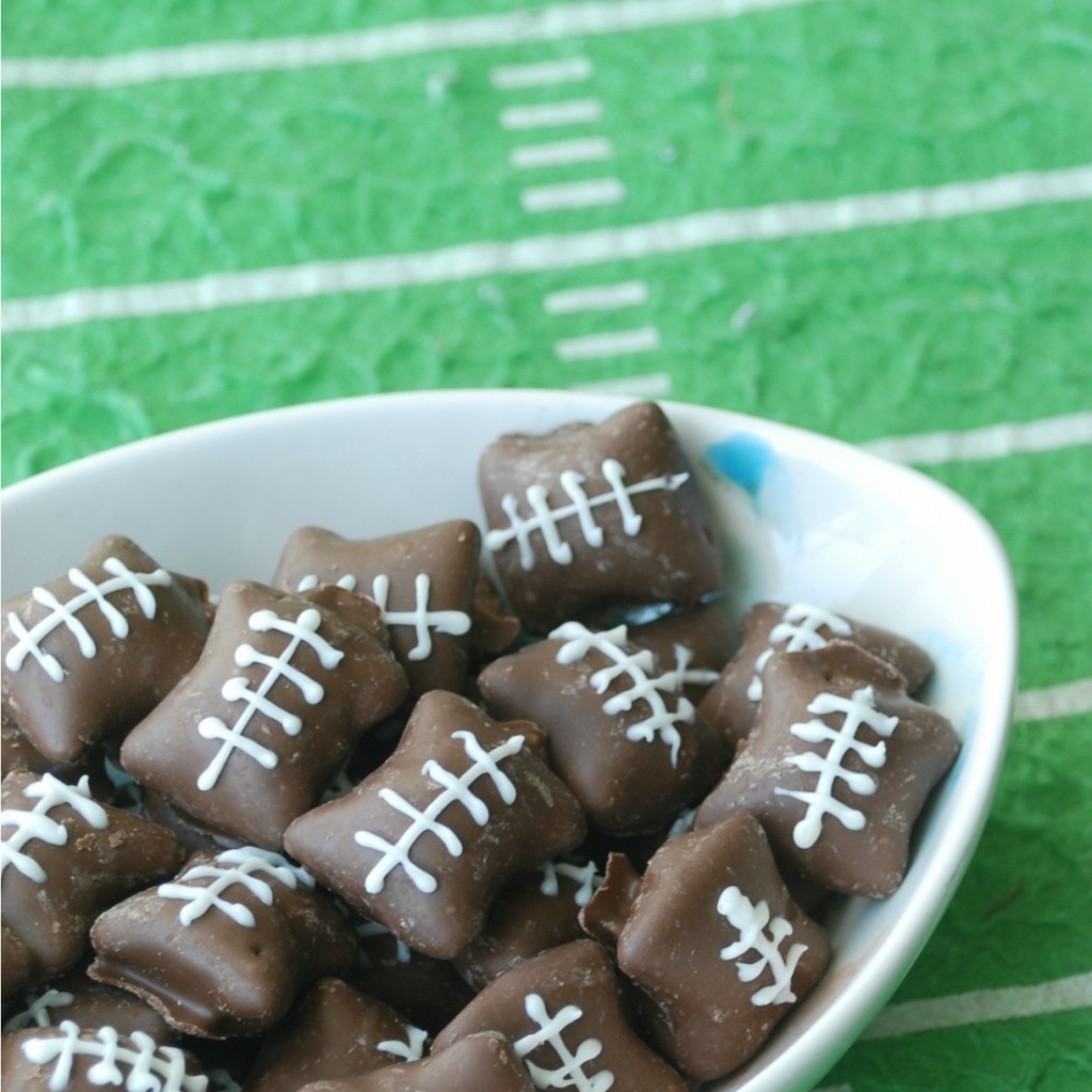 You won't believe how easy these adorable chocolate-covered, peanut butter-filled pretzel footballs are to make!
