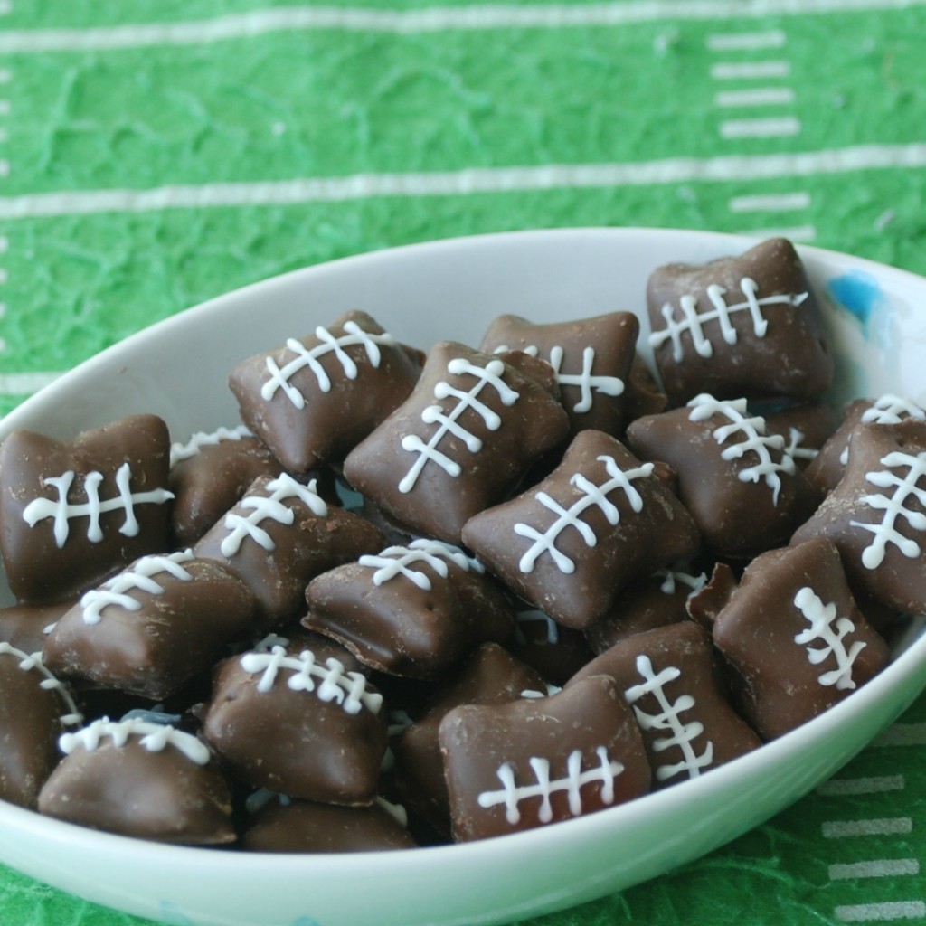 You won't believe how easy these adorable chocolate-covered, peanut butter-filled pretzel footballs are to make!