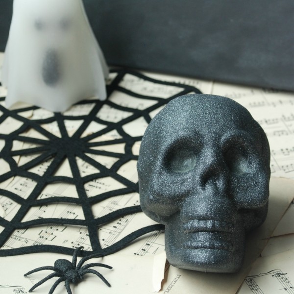Transform a dollar store skull into a cool, creepy, glittery decoration