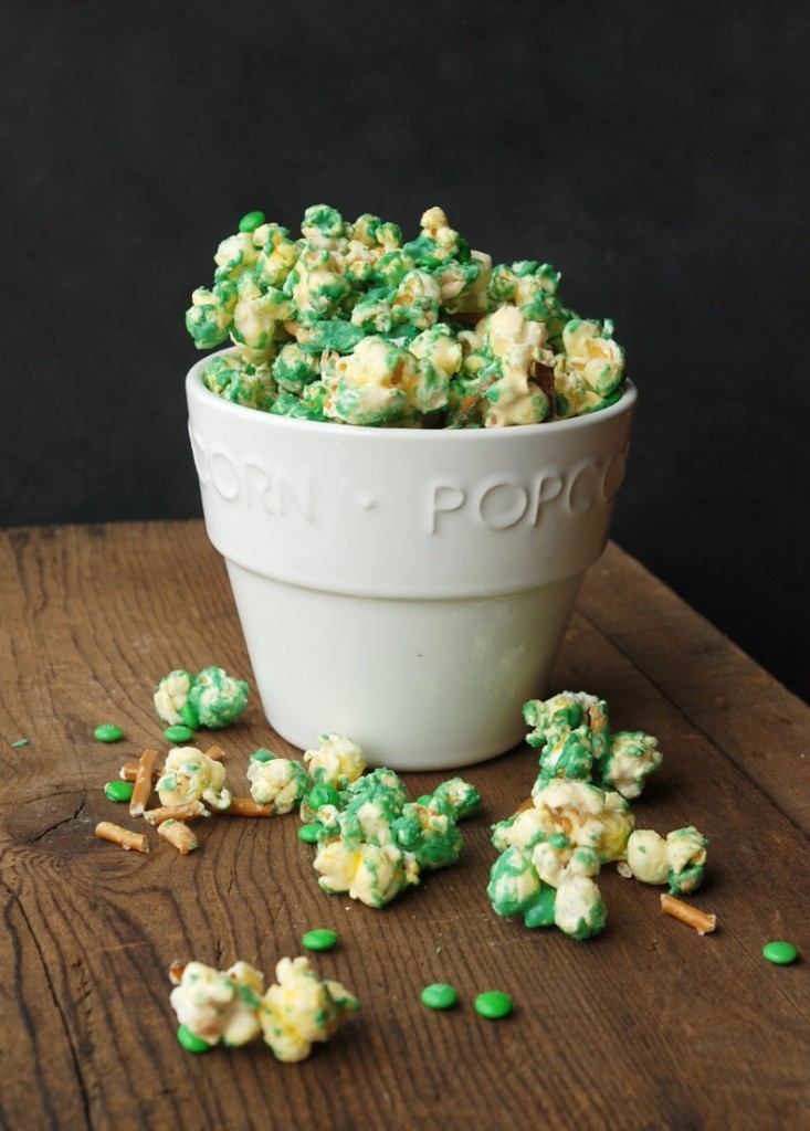 Make a quick and delicious sweet, salty snack mix with popcorn, candy melts, pretzels, peanuts and whatever else you have on hand! This sounds SO addicting!!