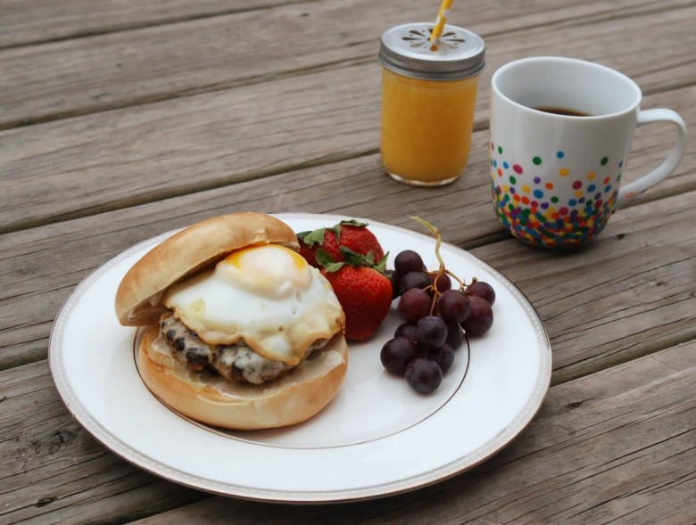 A Philly Cream Cheese-stuffed sausage patty topped with a Kraft Single & a fried egg, served on a toasted bagel with Miracle Whip. #SayCheeseburger #shop