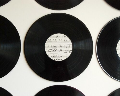 Make awesome new art for your walls out of some old vinyl records and some vintage sheet music!