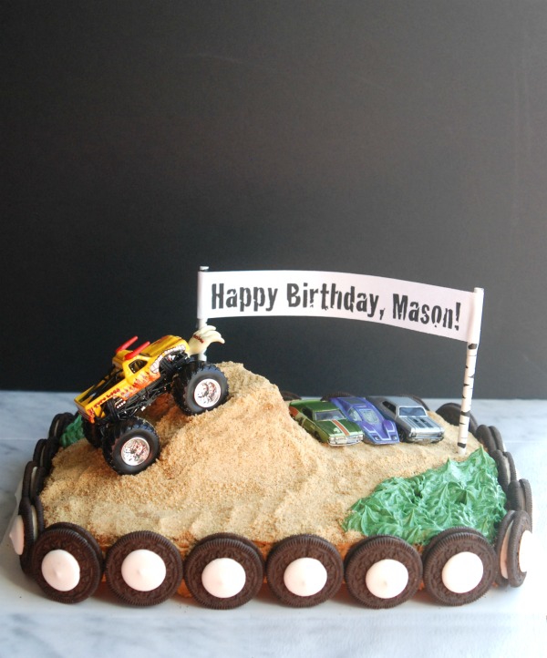 This monster truck birthday cake is so much easier to make than it looks. I love that it's covered with graham cracker crumbs and Oreos, because you don't have to have any frosting skill to make it look great!