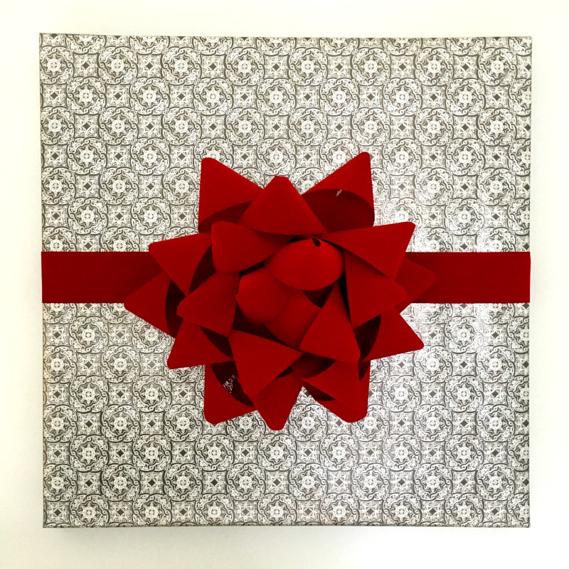 Making a huge present-style bow out of ribbon is actually way easier than you'd think!