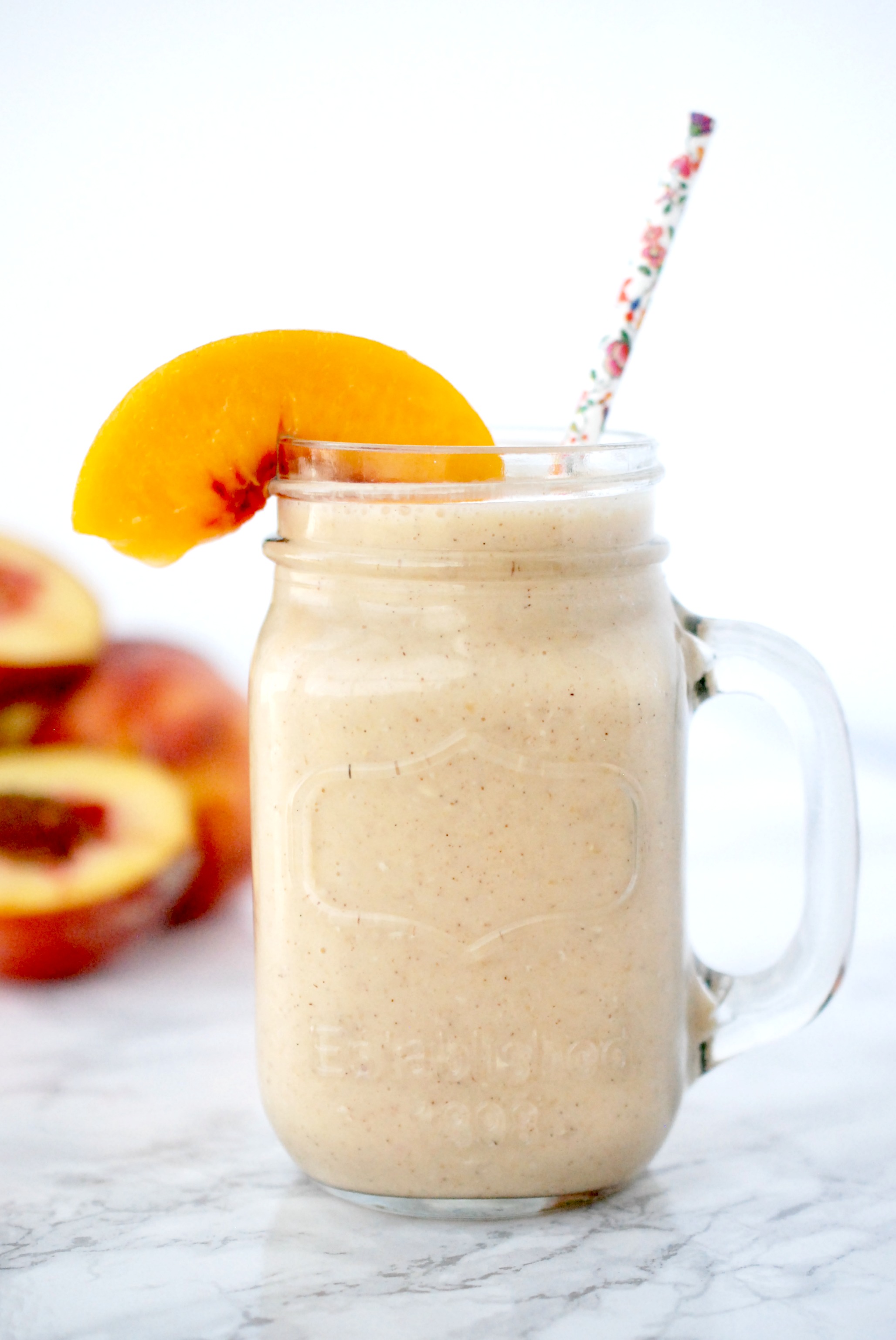 A rich, creamy and delicious smoothie that tastes just like peach cobbler. Perfect for a snack, dessert or breakfast on the go!
