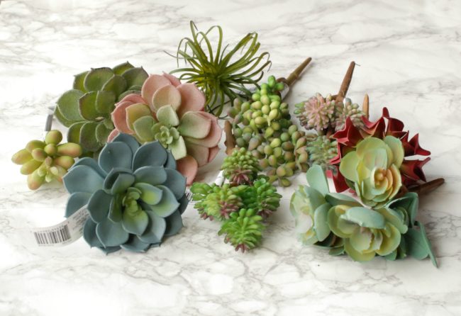 Make this rustic succulent planter using faux succulents from the craft store.