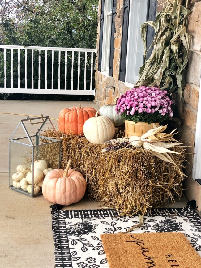 Front porch decorated for fall