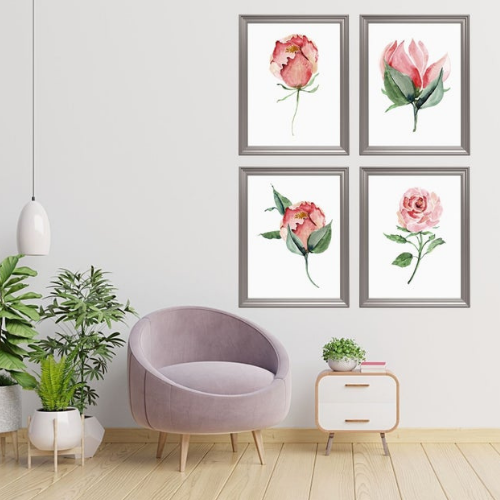 A gallery wall of brightly colored watercolor art prints over a tan colored sofa